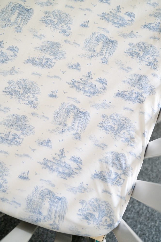 The Gilded Bird Spring Toile Blue Fitted Cot Sheet