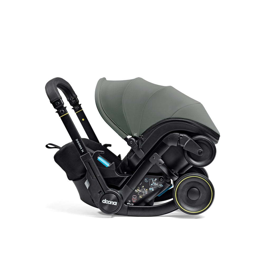 Doona X Recline Car Seat & Stroller - Green Inc FREE Vehicle Seat Protector Worth £29.95!